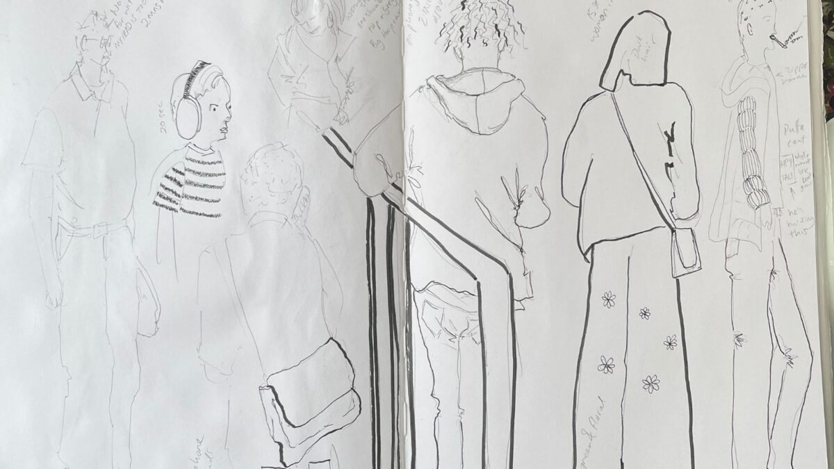 Sketches of people in front of a store in my A4 talens sketchbook