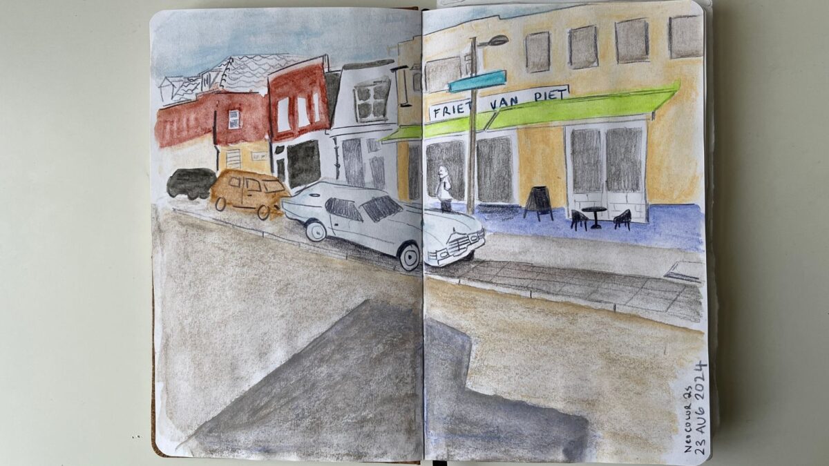 Using Neocolor 2 water-soluble crayons to create a full spread of a food place in town