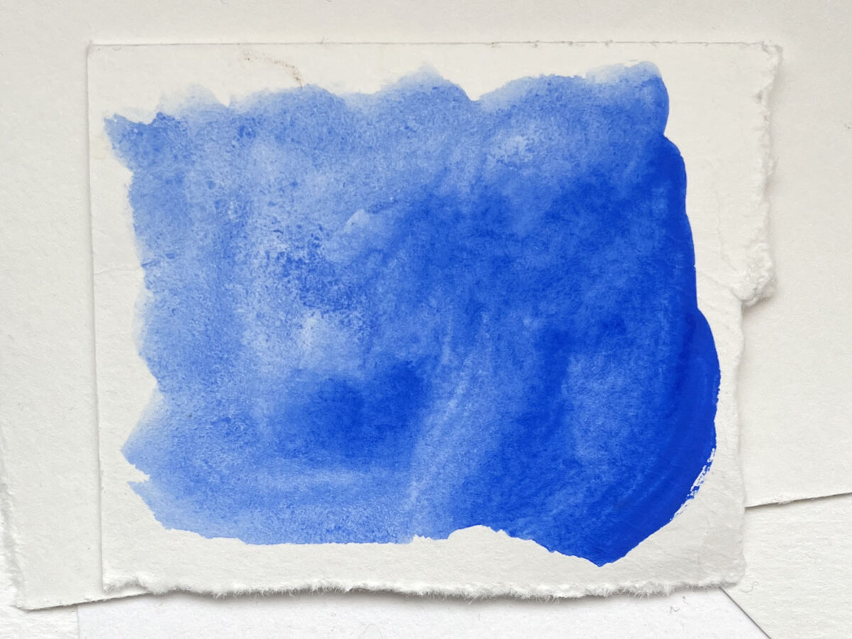 The ultramarine blue acrylic gouache when dry